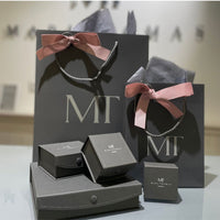 Button silver earrings by Katy Tromans