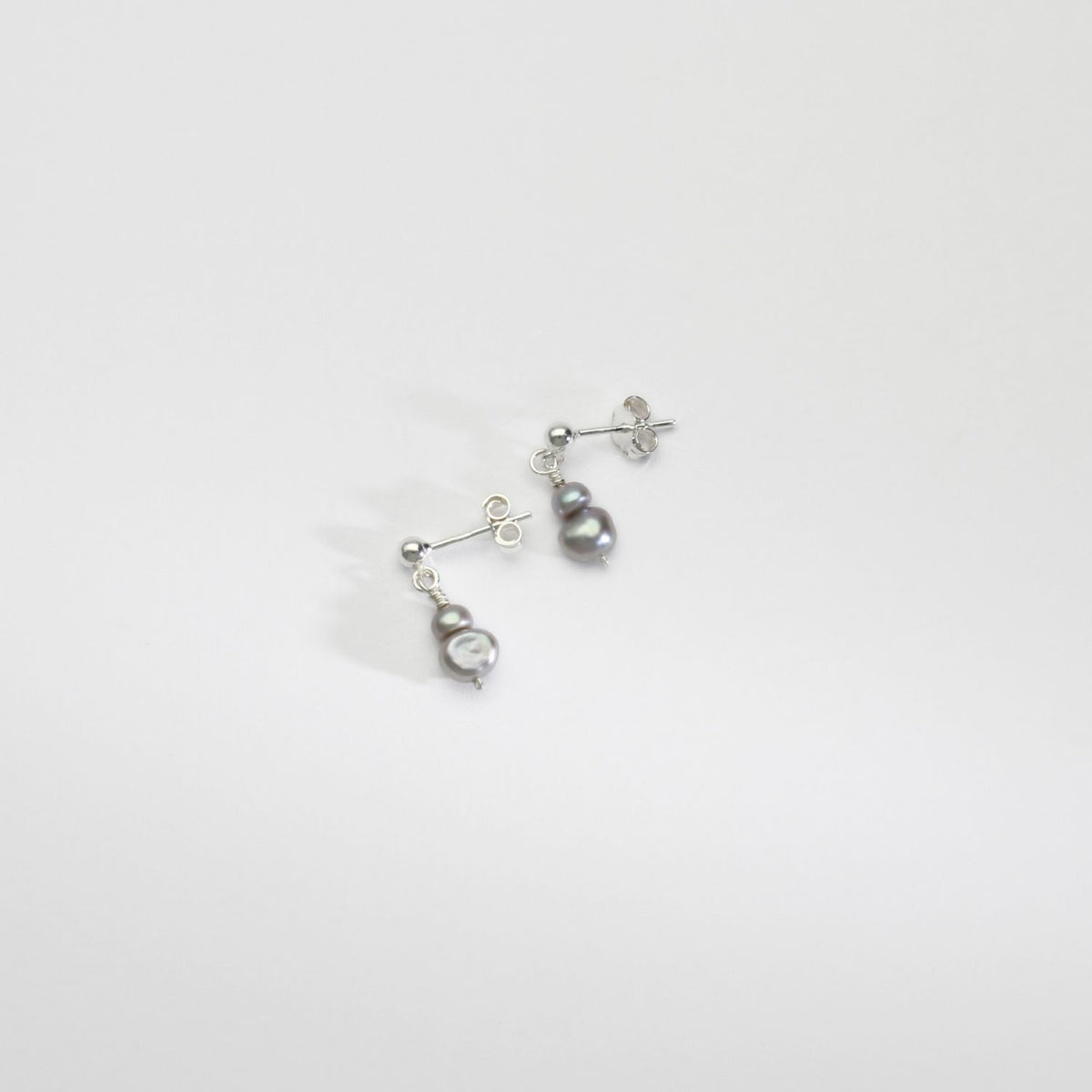 Wee blister grey double pearls silver stud earrings by Natalie Vardey