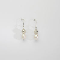 Silver bound bead & white pearl drop earrings by Natalie Vardey