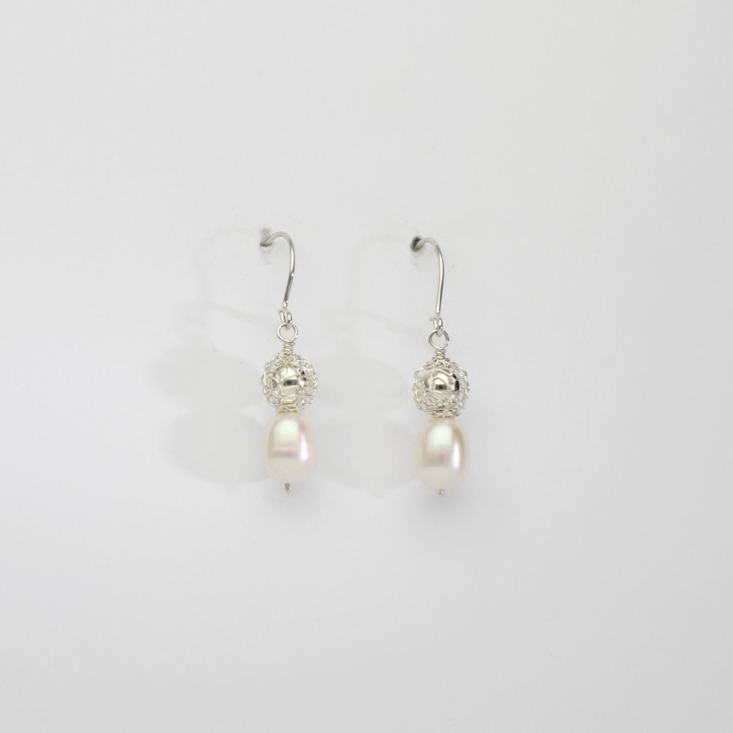 Silver bound bead & white pearl drop earrings by Natalie Vardey