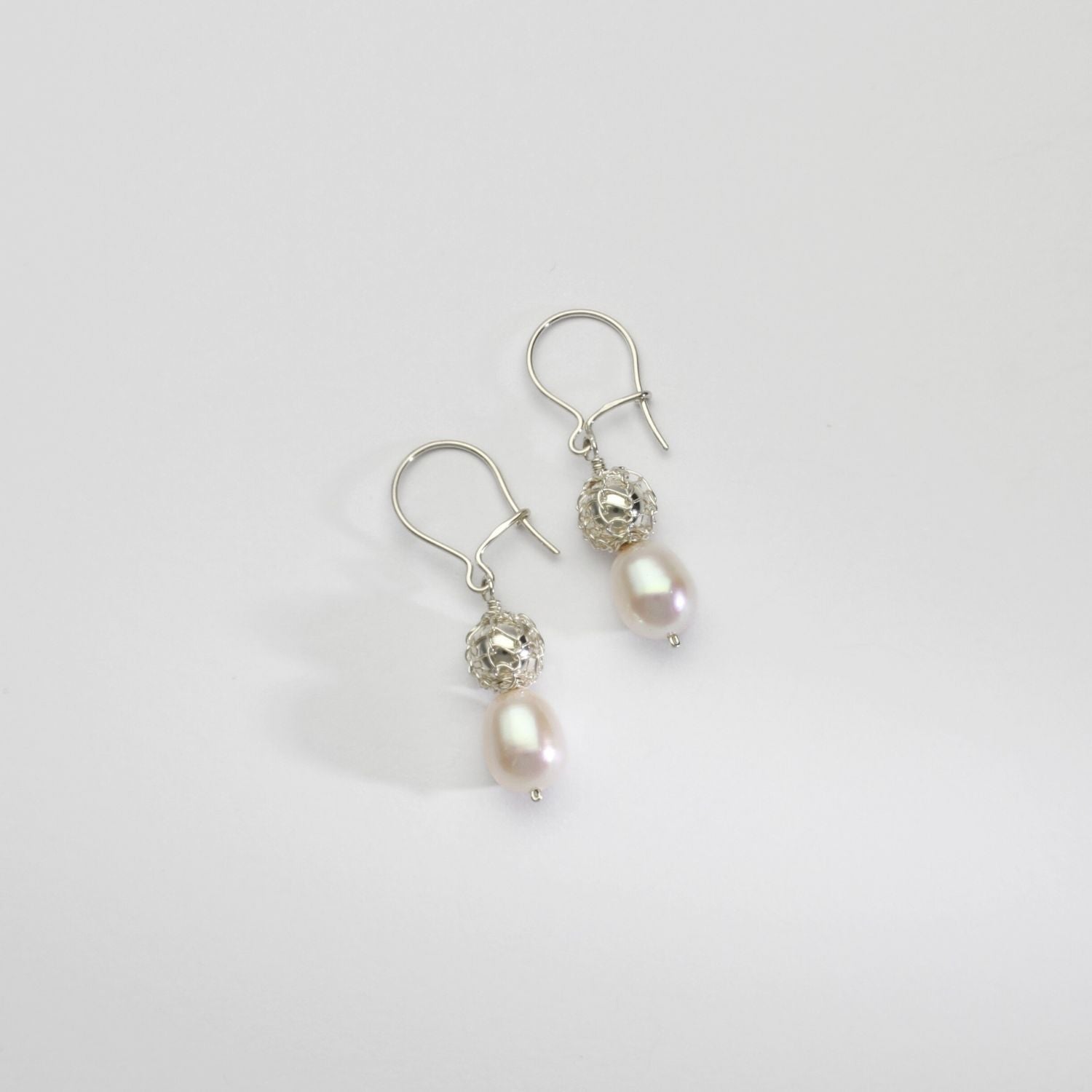 Silver bound bead & white pearl drop earrings by Natalie Vardey
