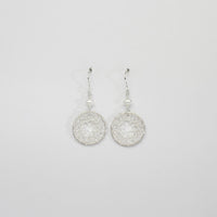 Lace circle & white pearl silver hook earrings by Natalie Vardey