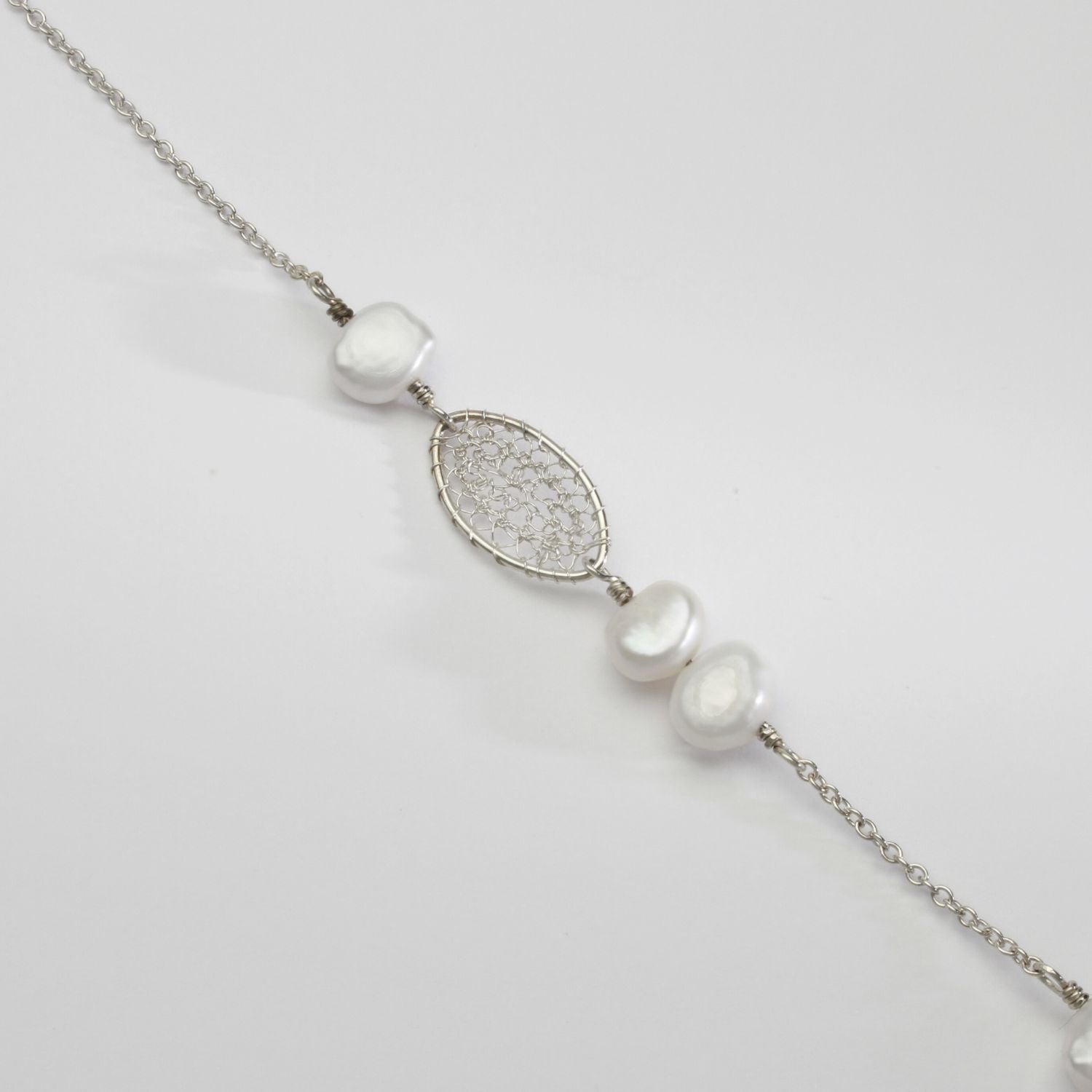 Silver & white pearls necklace by Natalie Vardey