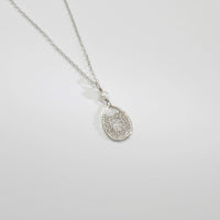 Silver oval lace and white pearl pendant by Natalie Vardey
