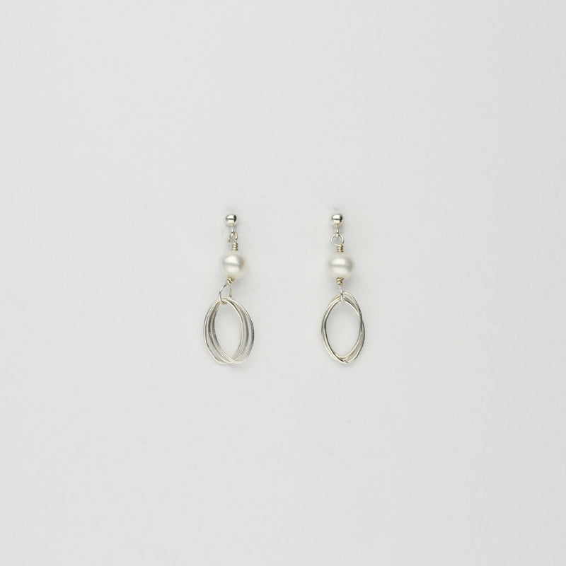 Triple loop & white pearl stud earrings by Natalie Vardey