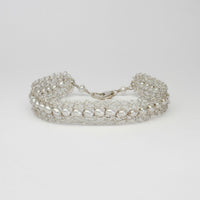 Lace silver bracelet with white pearls by Natalie Vardey