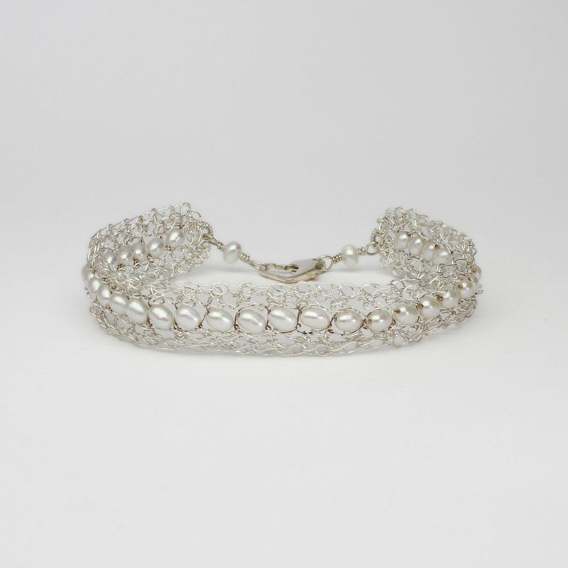 Lace silver bracelet with white pearls by Natalie Vardey