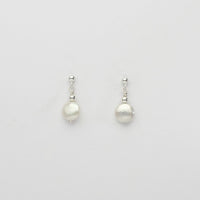 Small white coin pearl & bead stud earrings by Natalie Vardey