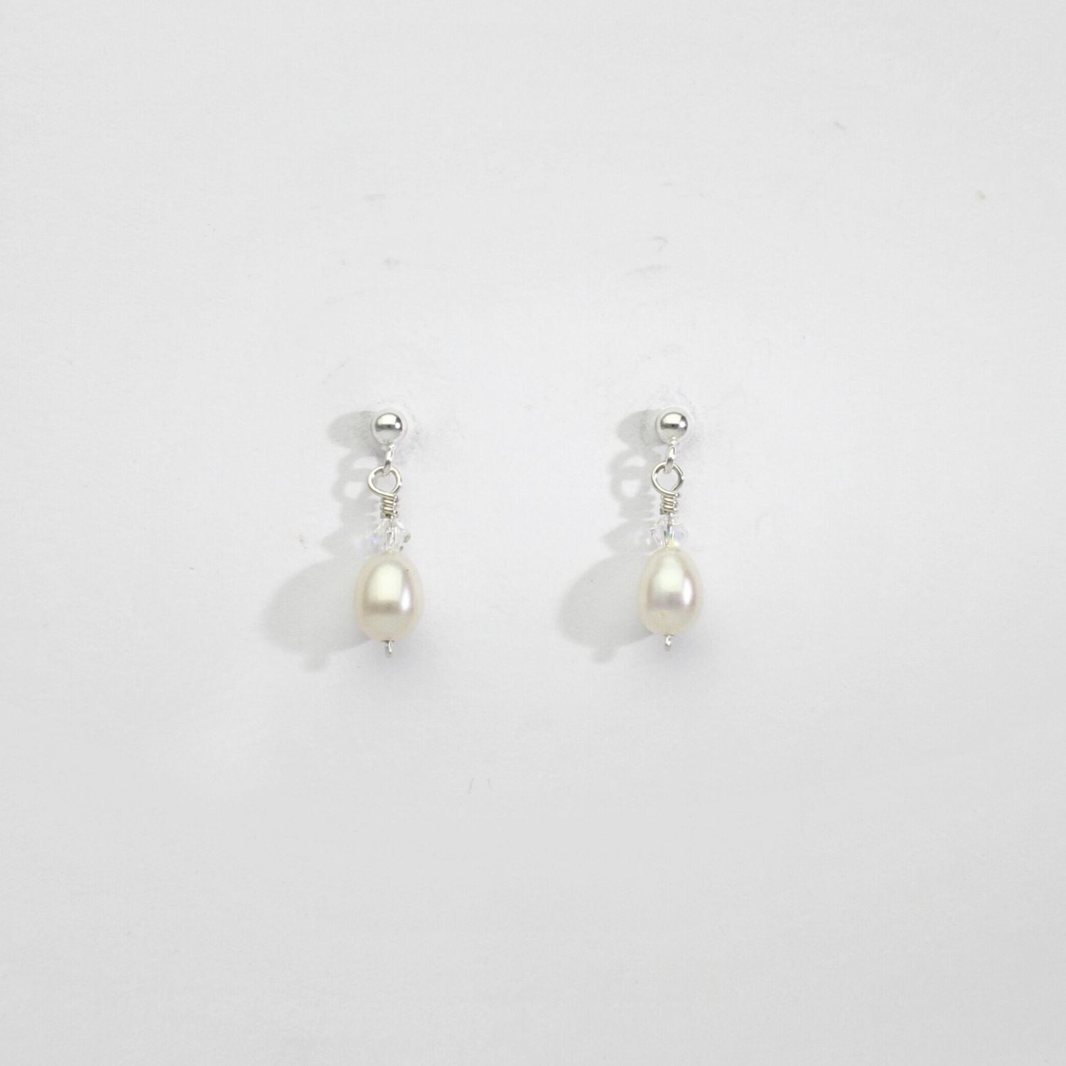 White pearl & swarovski drop earrings by Natalie Vardey
