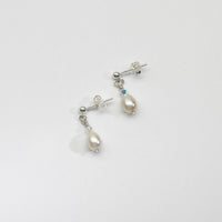 White pearl & swarovski drop earrings by Natalie Vardey