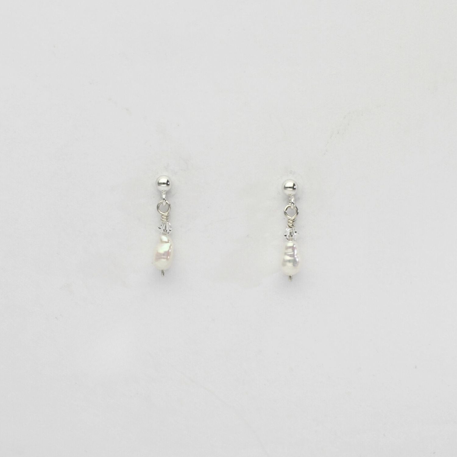 White pearl & swarovski stud earrings by Natalie Vardey