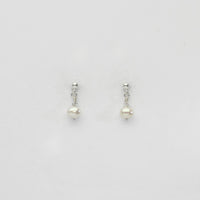 Small white pearl & swarovski stud earrings by Natalie Vardey