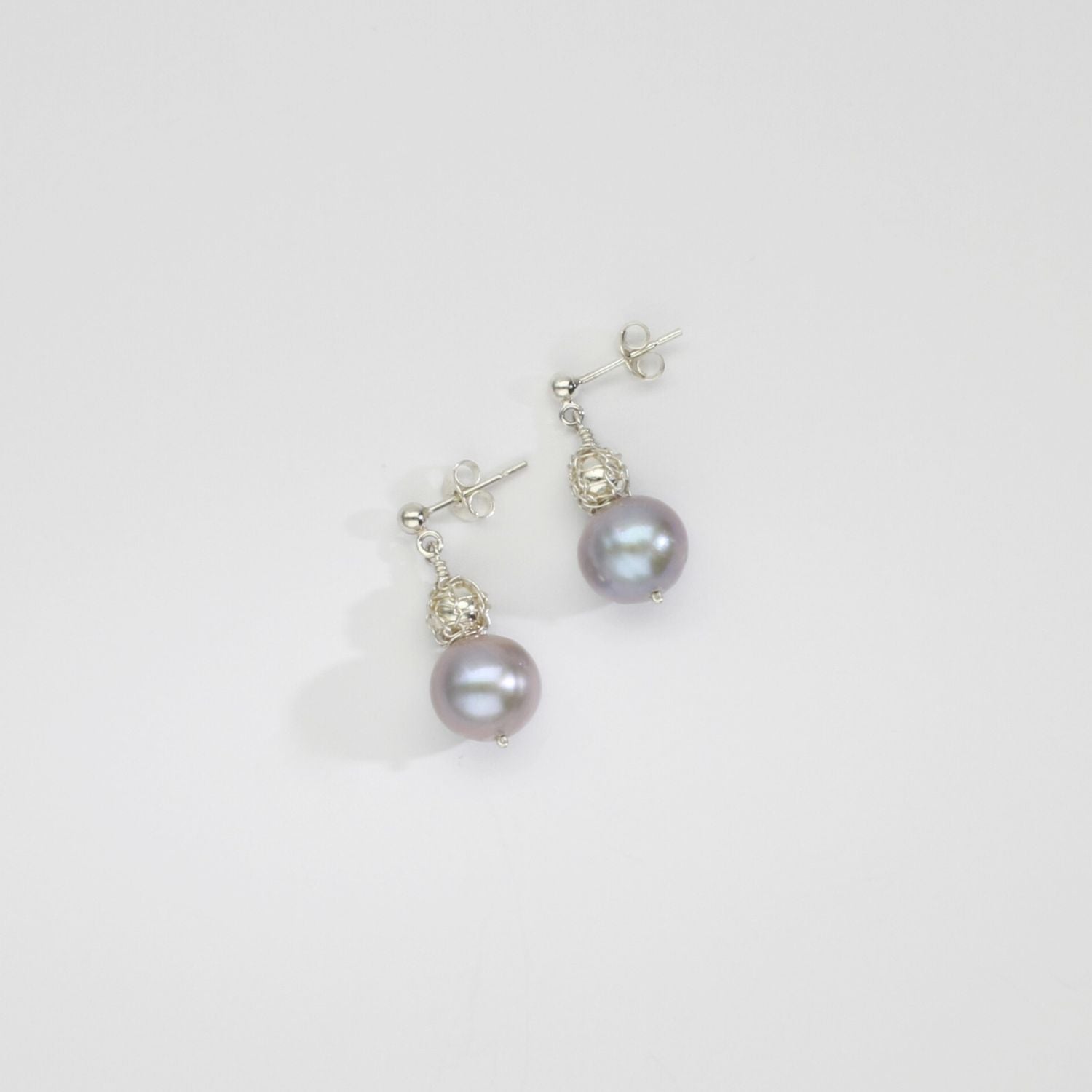 Grey pearls & bound bead stud earrings by Natalie Vardey