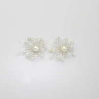 Flower frill white pearl stud earrings by Natalie Vardey
