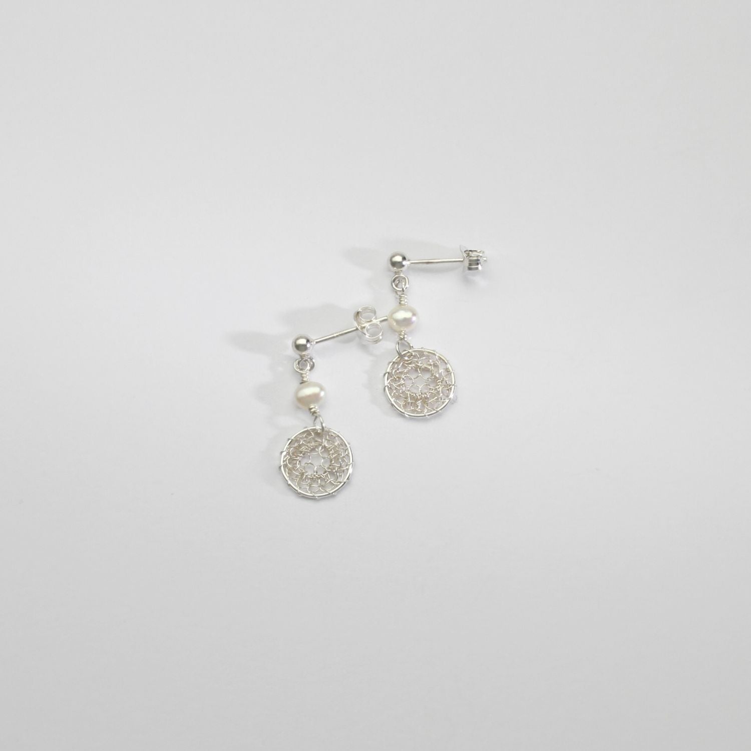 Small silver lace & white pearl stud earrings by Natalie Vardey