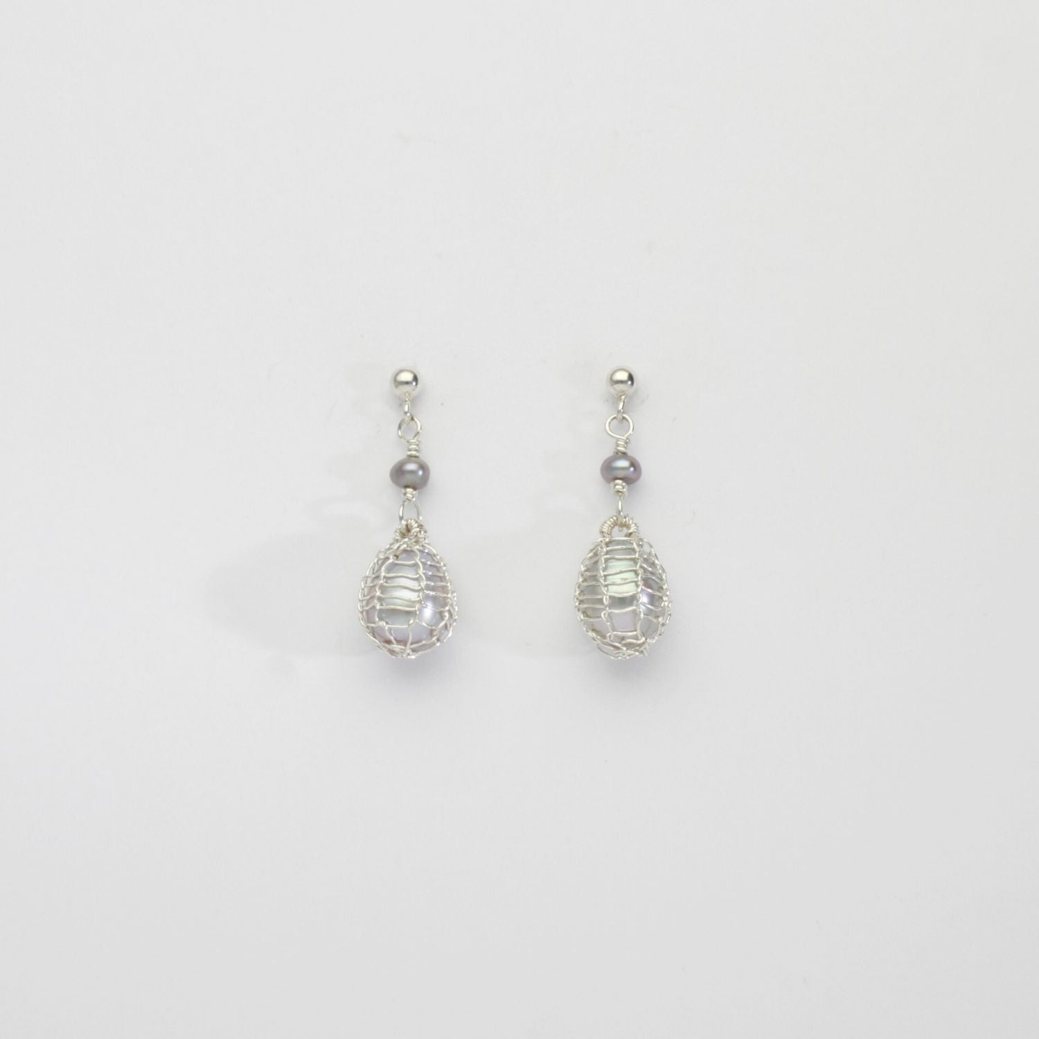 Grey pearl bound silver stud earrings by Natalie Vardey