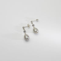 Grey pearl bound silver stud earrings by Natalie Vardey
