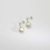 White pearl coin & silver bead stud earrings by Natalie Vardey