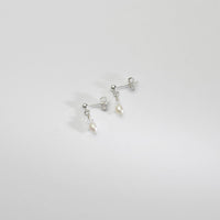 Small white rice & Swarovski crystal silver stud earrings by Natalie Vardey