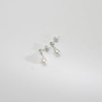 White rice & Swarovski crystal silver stud earrings by Natalie Vardey