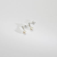 White squab & Swarovski crystal silver stud earrings by Natalie Vardey