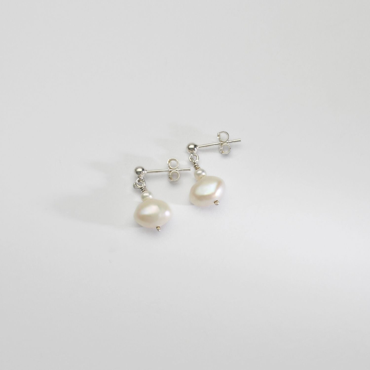 White blister & white pearls silver stud earrings by Natalie Vardey