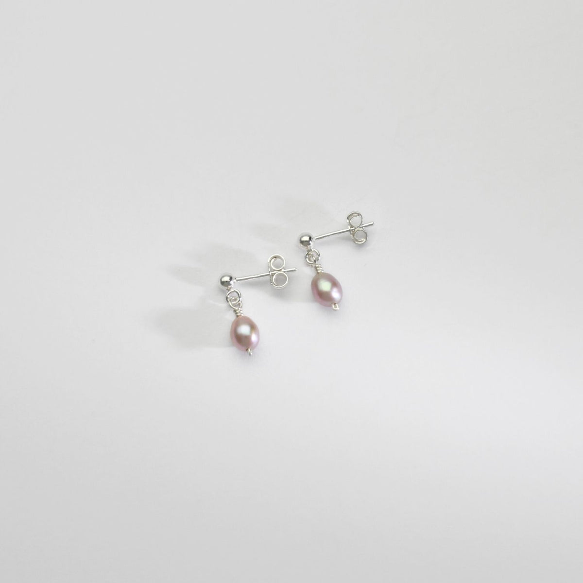 Lilac rice pearls silver stud earrings by Natalie Vardey