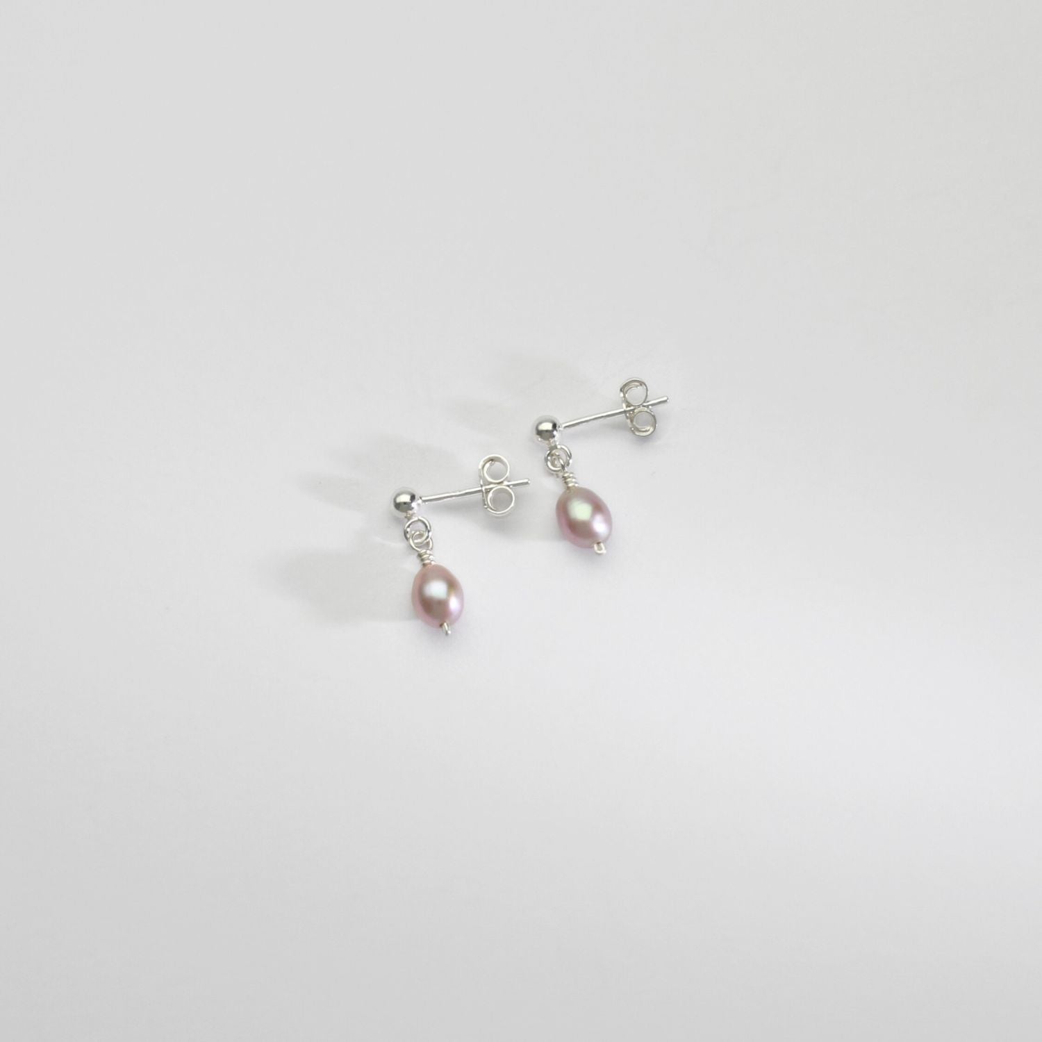 Lilac rice pearls silver stud earrings by Natalie Vardey