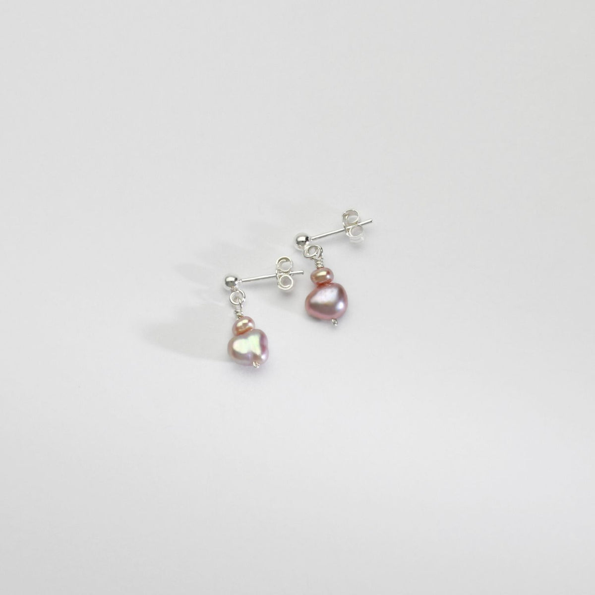 Wee lilac blister double pearls silver stud earrings by Natalie Vardey