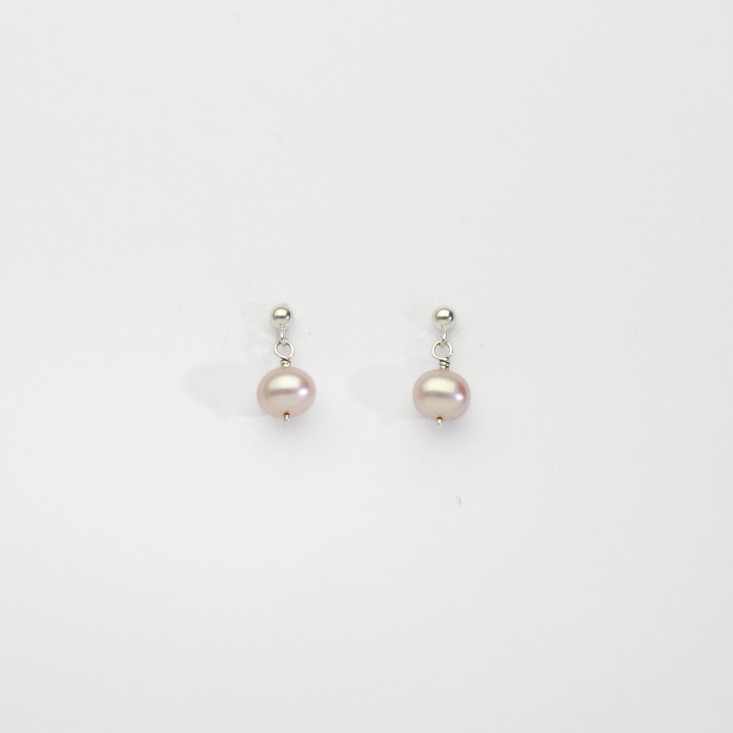 Lilac squab pearls silver stud earrings by Natalie Vardey