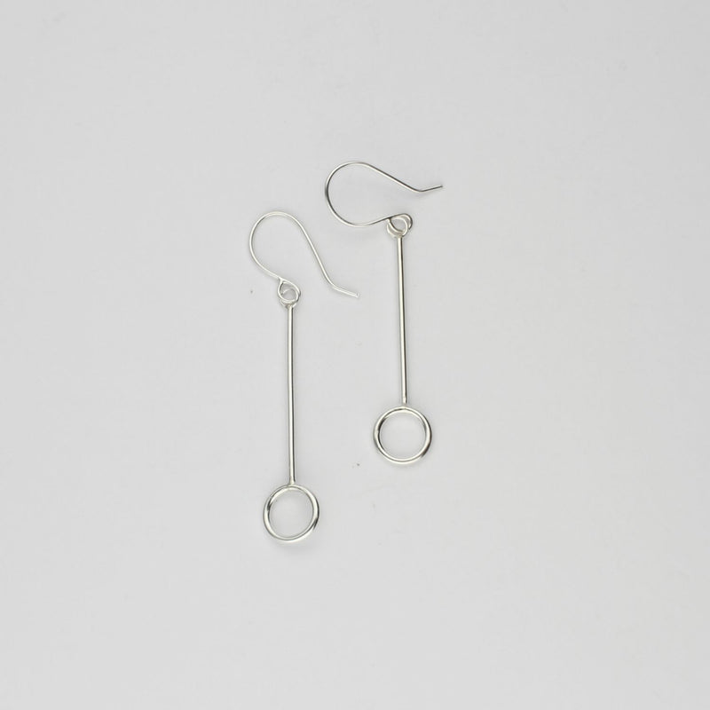 Small circle drop silver earrings by Polished Grey