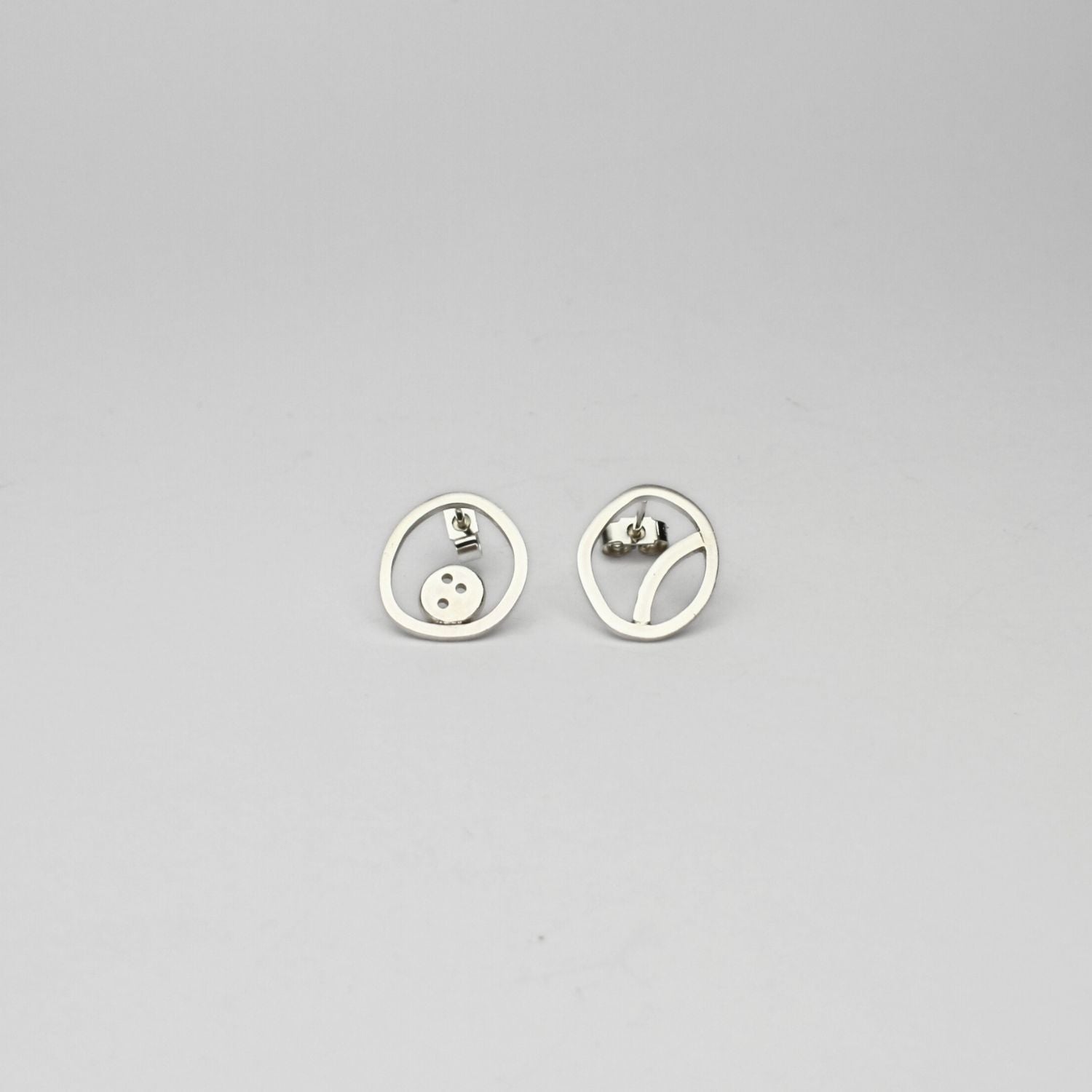 Pebble shape silver studs by Polished Grey