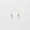 Large silver arc studs by Polished Grey
