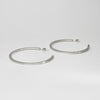 Large silver hoops by Polished Grey