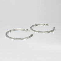 Large silver hoops by Polished Grey
