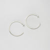 Large silver hoops by Polished Grey