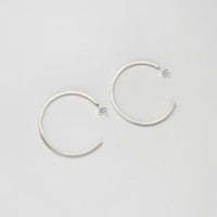 Large silver hoops by Polished Grey