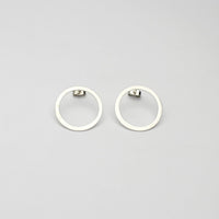 Large circle silver studs by Polished Grey