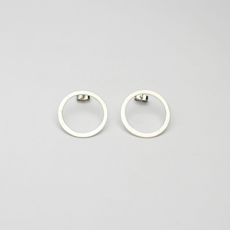 Large circle silver studs by Polished Grey