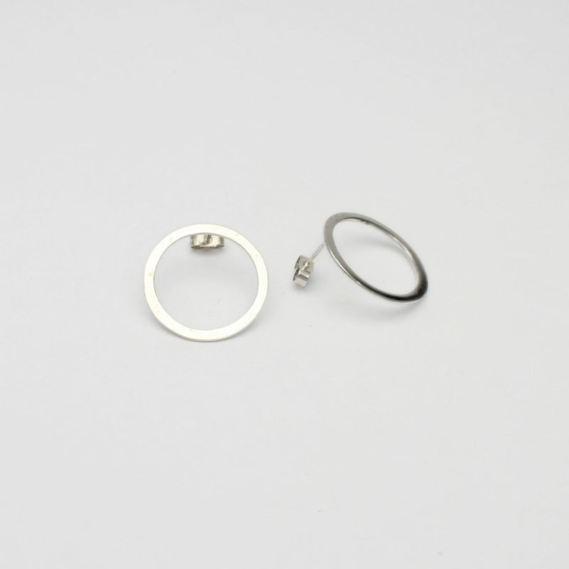 Large circle silver studs by Polished Grey