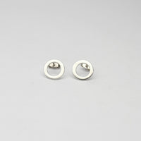 Small circle silver studs by Polished Grey