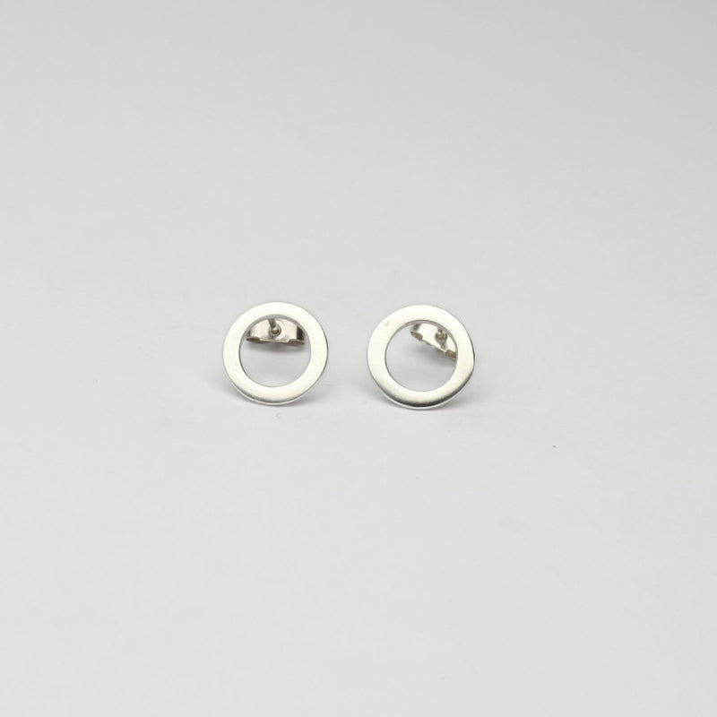 Small circle silver studs by Polished Grey
