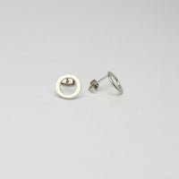 Small circle silver studs by Polished Grey