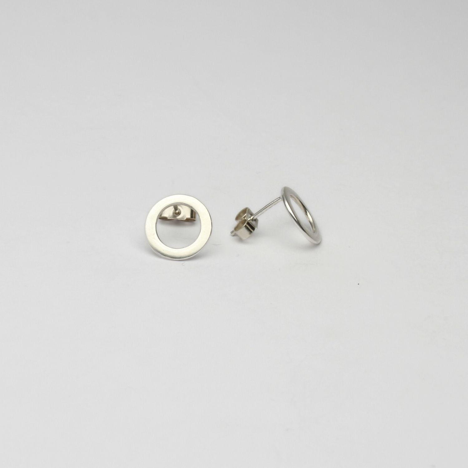 Small circle silver studs by Polished Grey