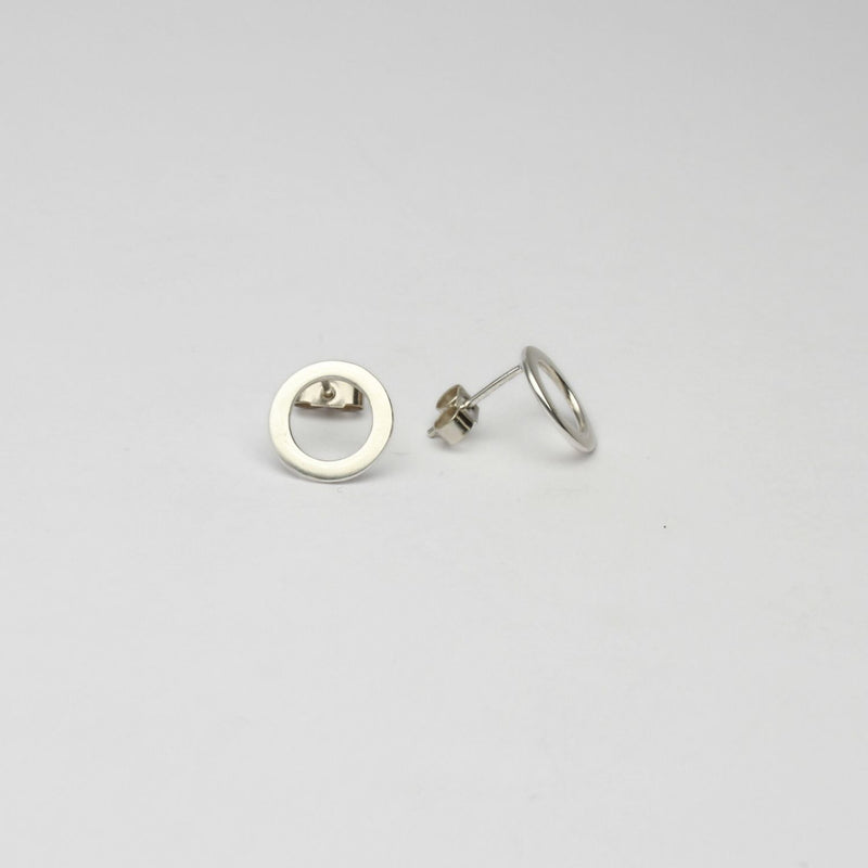 Small circle silver studs by Polished Grey
