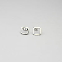 Small square silver studs by Polished Grey