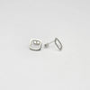 Small square silver studs by Polished Grey