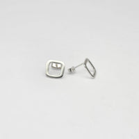 Small square silver studs by Polished Grey