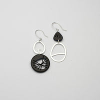 Black Tiddleywink stitched pebble silver earrings by Polished Grey