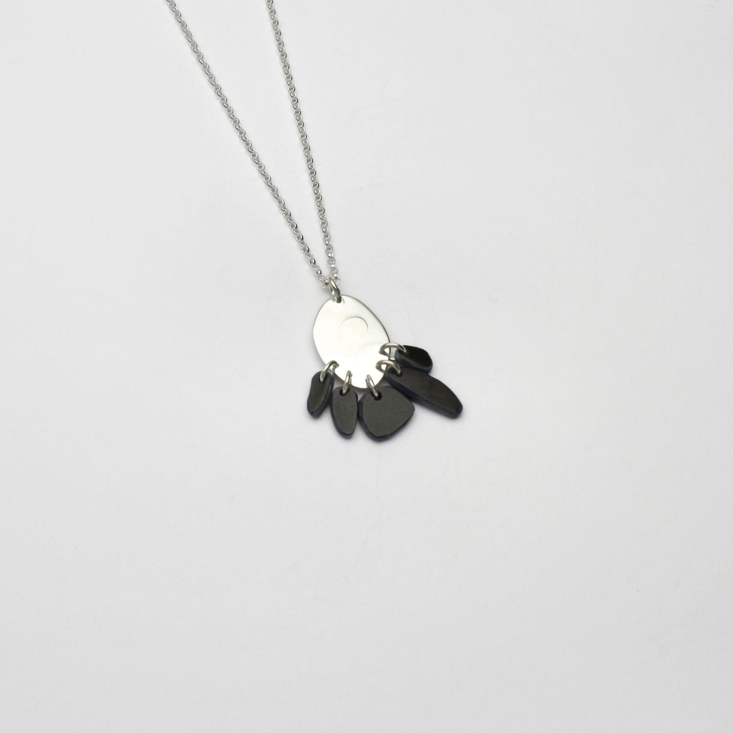 Black Tiddleywink pebble silver necklace by Polished Grey